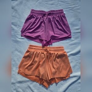 2 Pairs Of Yogalicious Athletic Shorts.  Purple And Orange. New Size LG (12).
